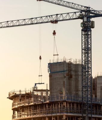 Construction cranes working on a building site. Manchester in the United Kingdom.